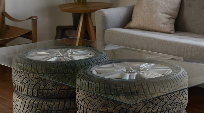 Tires used as a coffee table in living room