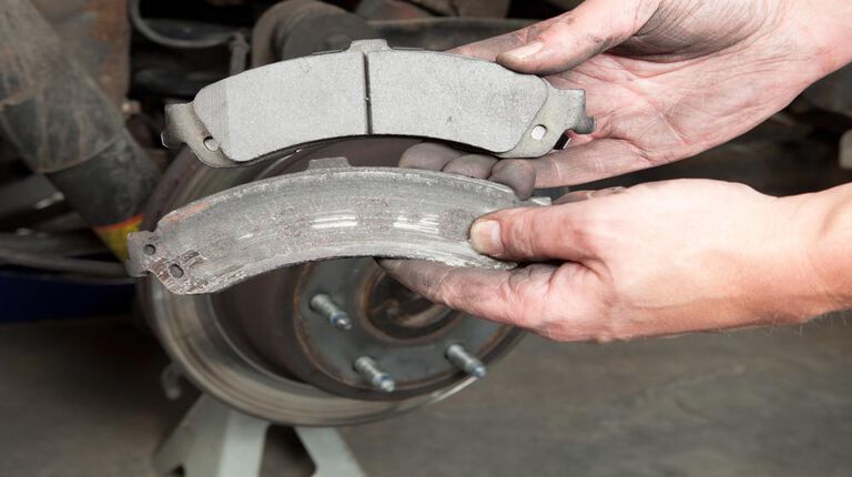 Inspecting brakes to determine how often should you change your brakes?  