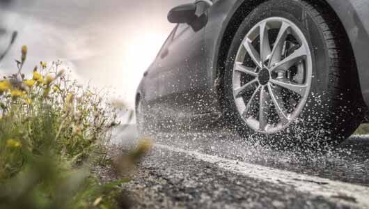 Buying new tires for your electric vehicle Electric Vehicle with new tires.