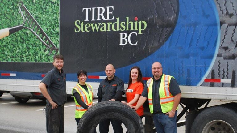 Why are there environmental fees on tires? Kal Tire team members with Tire Stewardship truck