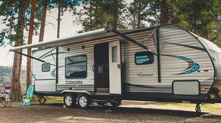 Travel Trailer set up for camping with the best trailer tires.