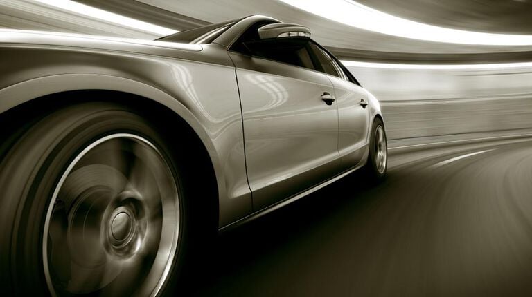 What are UTQG ratings? Performance car on road