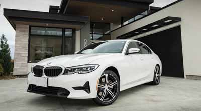 Tires Canada - Car driving on road with new auto tires