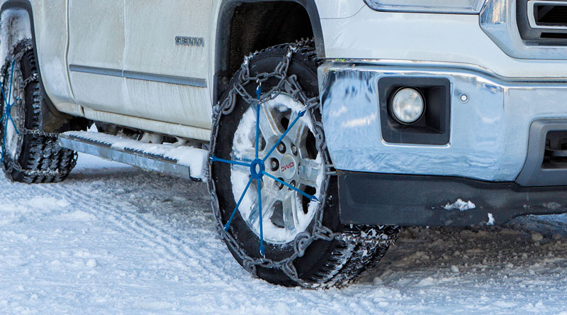 Vehicle with tire chains