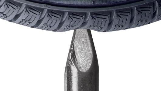 Tire with a nail in it