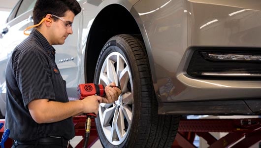 Rotating tires on car