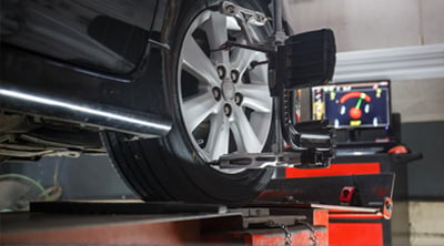 Vehicle getting a wheel alignment